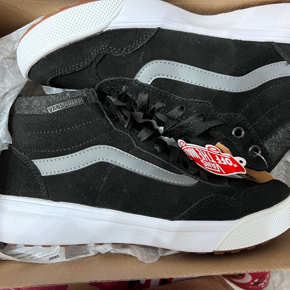 Women’s vans black high top sneaker